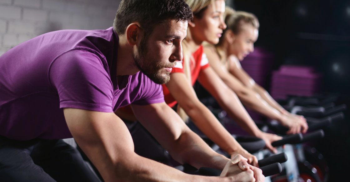An indoor cycling class
