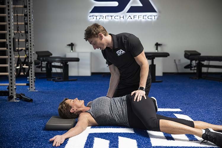 assisted stretching spinal twist