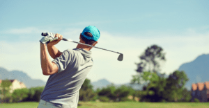 Man utilizes the correct golf swing form using the Kinematic Sequence to maximize performance.